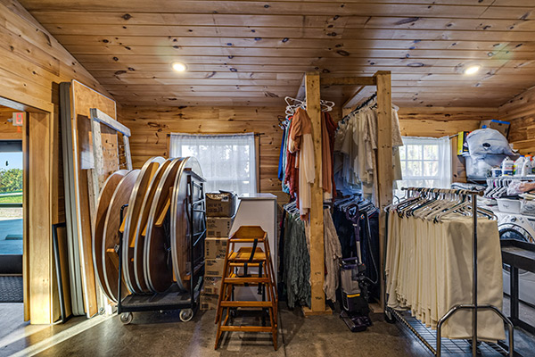 Tables, chairs and table linens galore in the storage room at The Homeplace